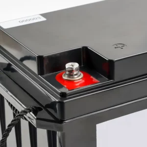 Detail of the red positive terminal of a 12V 24V lithium-ion battery