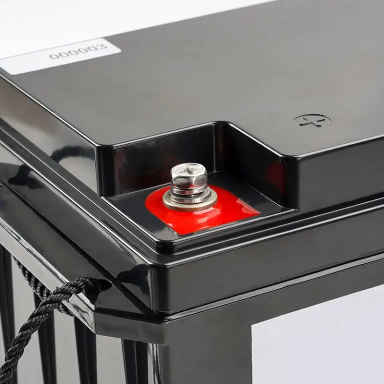 Detail of the red positive terminal of a 12V 24V lithium-ion battery