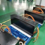 Packed electric forklift lithium-ion batteries on pallets in the factory