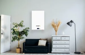 A home storage wall mounted battery hangs on the wall